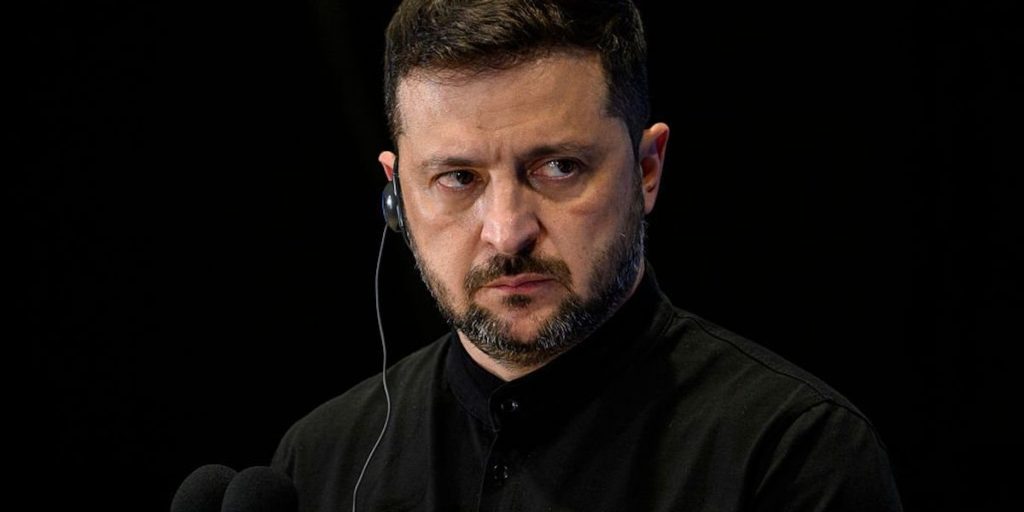 Zelenskyy, maintaining his role a year past the end of his term, takes charge of the anti-corruption bureau, leading to protests.