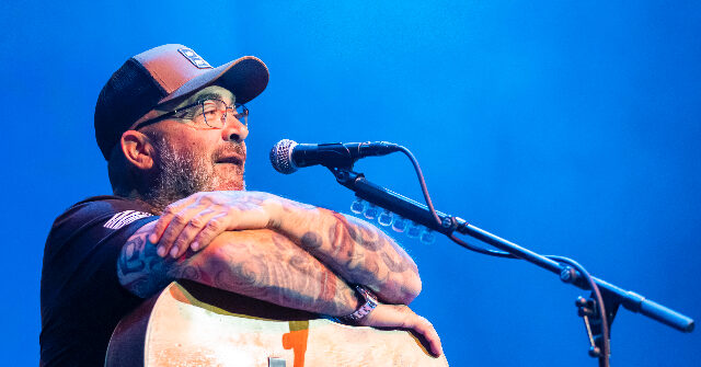 Aaron Lewis discusses the unfair music industry with Tucker Carlson, criticizes 'hypocritical' Bruce Springsteen, and takes aim at Democrats.