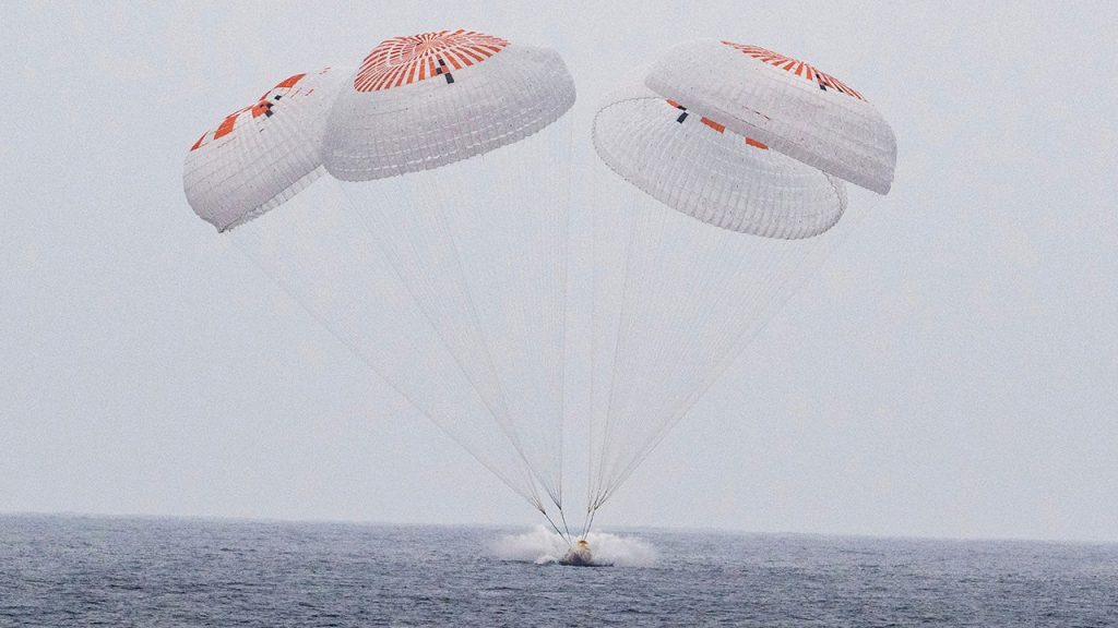 Astronauts come back to Earth with a splash in the Pacific after a 5-month mission at the ISS