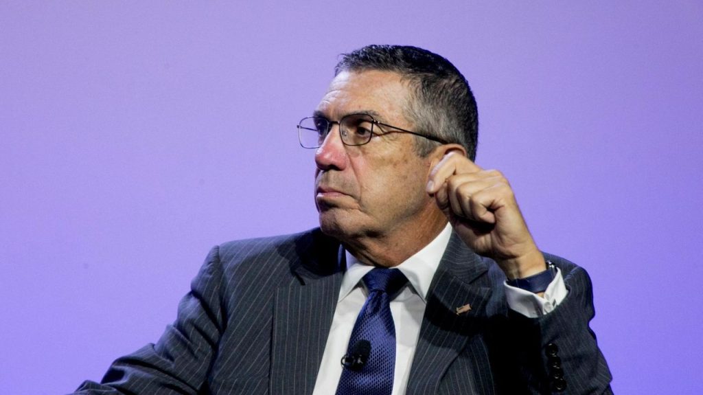 Bank executive charged with money laundering in lawsuit