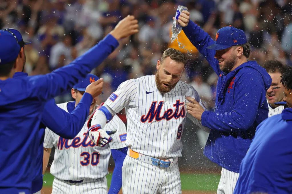 Brandon Nimmo's game-ending hit in the ninth leads the Mets over the Phillies