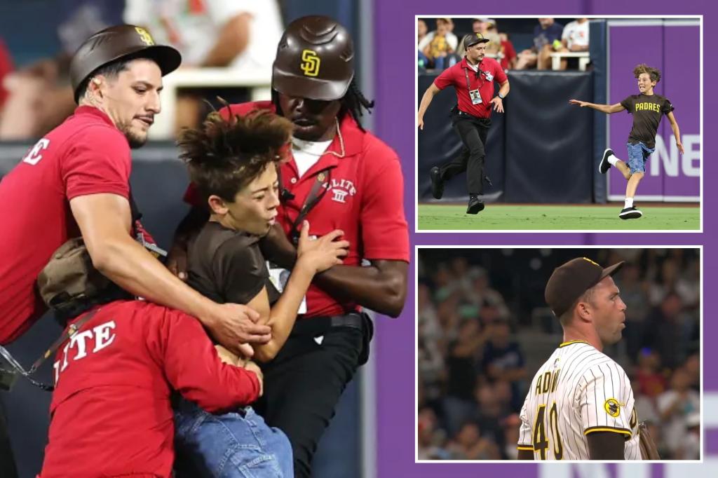 Child taken down by Padres security for running onto the field, and fans reacted negatively.