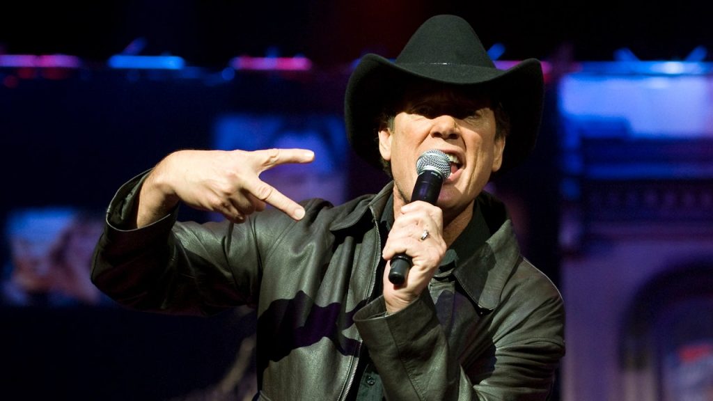 Country singer Ronnie McDowell shares his conversation with his son during an onstage stroke.