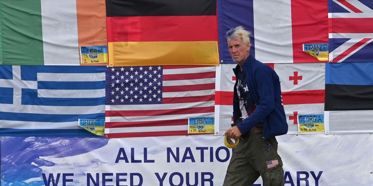 Court permits sniper specialist for accused assassin to testify at trial despite government objections.