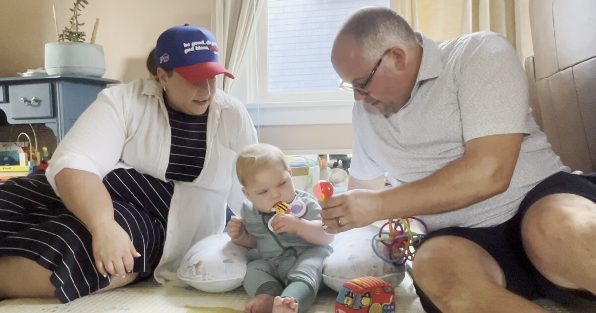 Desperate parents struggle against insurance rejection for their baby's brain surgery