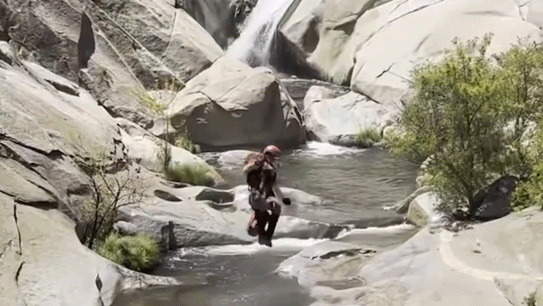 Hiker rescued alive after being trapped behind California waterfall for days