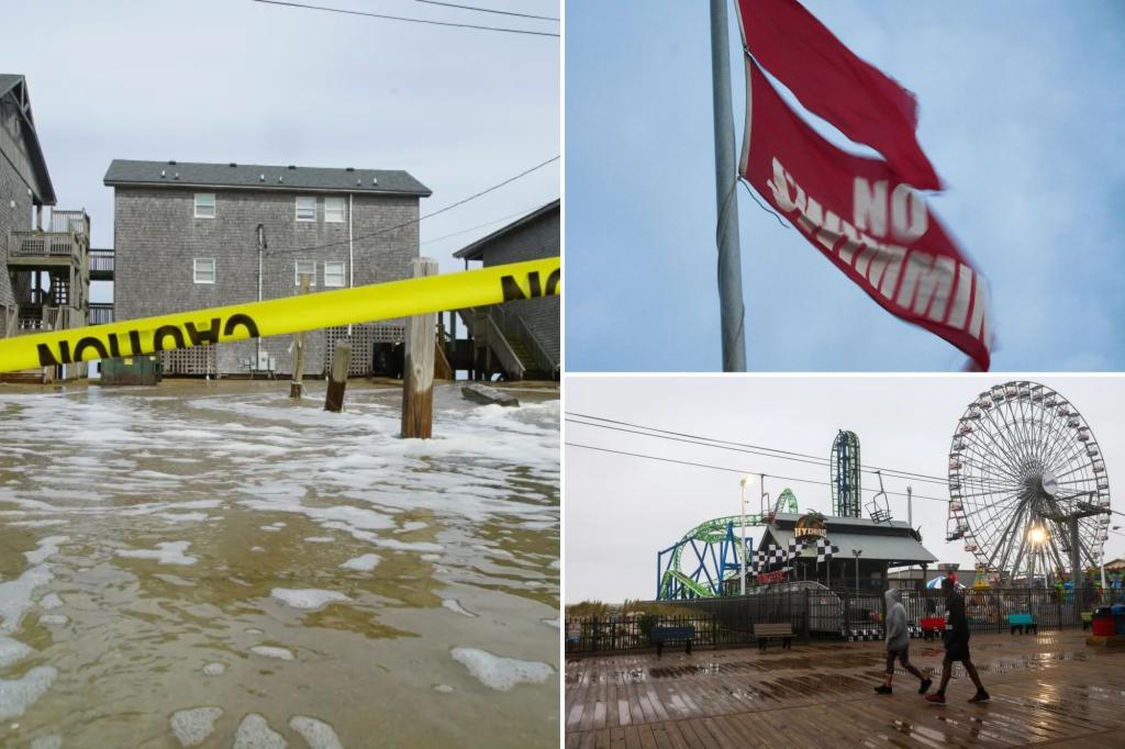 Hurricane Erin strikes the Outer Banks of North Carolina, causing flooding on a section of highway.