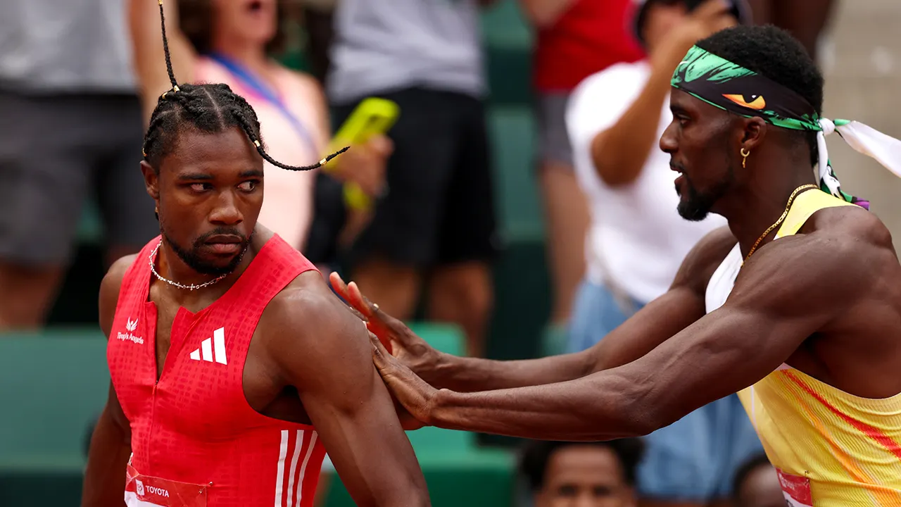 Kenny Bednarek pushes Noah Lyles after the 200m race at a US track event