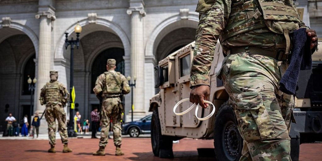 Lawyer accused of spitting on National Guard soldiers while riding a scooter in DC