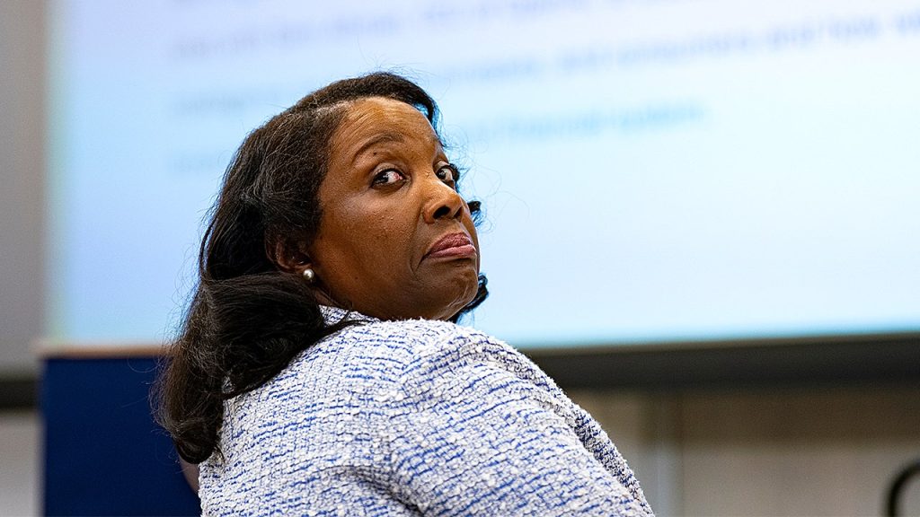 Legal representatives for Cook and the DOJ engage in a tense battle over the federal dismissal.