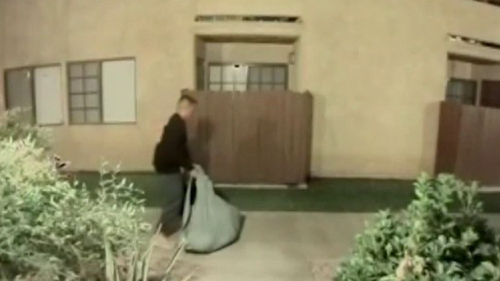 Man charged with killing his wife turns himself in to Interpol in Peru