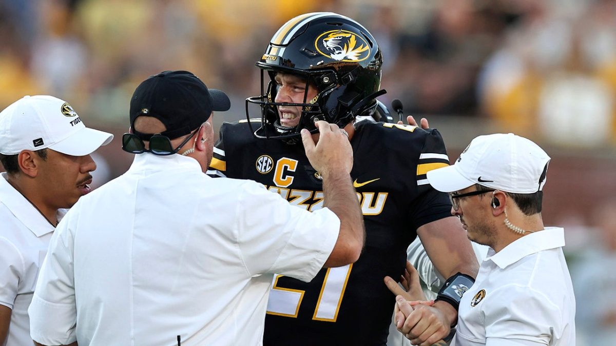Missouri quarterback Sam Horn injures his leg on the first play of the season's opening game.