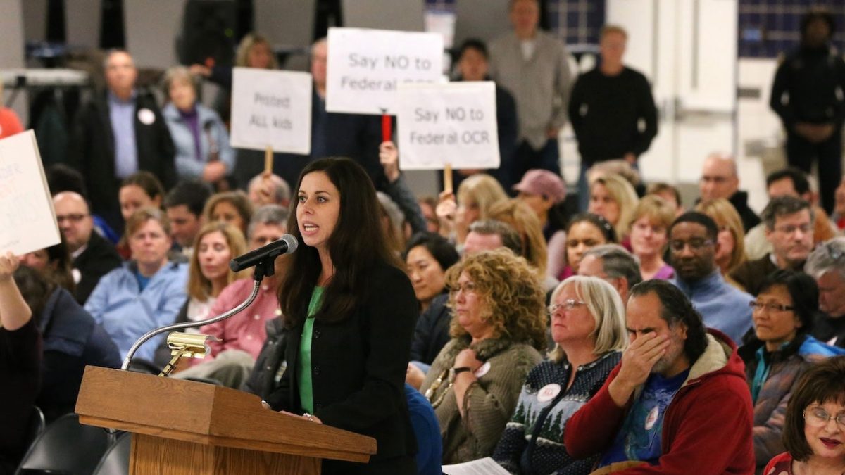 Parents in Illinois argue at school board meeting about transgender volleyball player