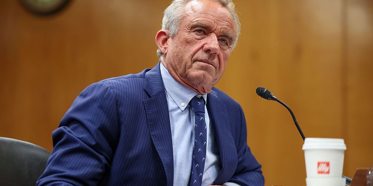 RFK Jr. criticizes Biden's vaccine reporting rule and focuses on doctors' secret motivations.