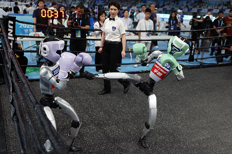 Robots compete, play soccer, malfunction, and fall at China's 'robot Olympics'