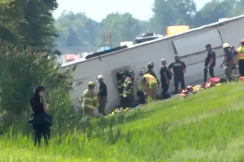 Several deaths reported after tour bus collides with a semi-truck