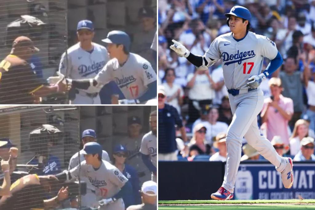 Shohei Ohtani from the Dodgers playfully gets back at a Padres fan