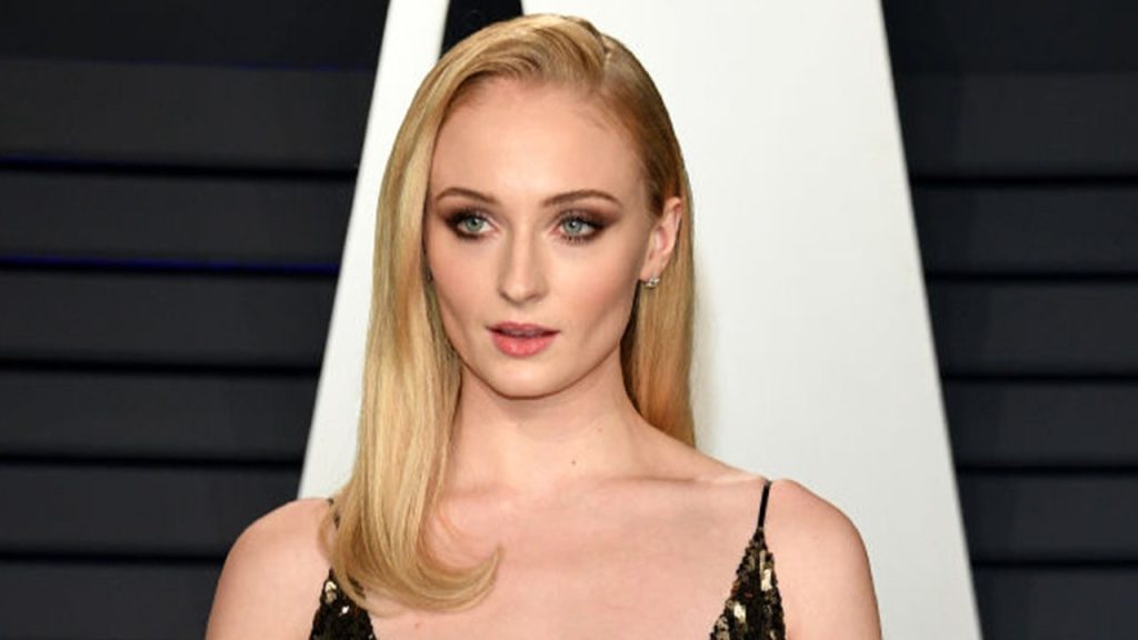 Sophie Turner responds to critics of her parenting after photos from the Oasis concert.