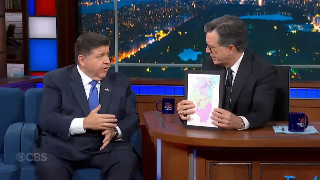 Stephen Colbert presents a map of Illinois gerrymandering to Gov. Pritzker.