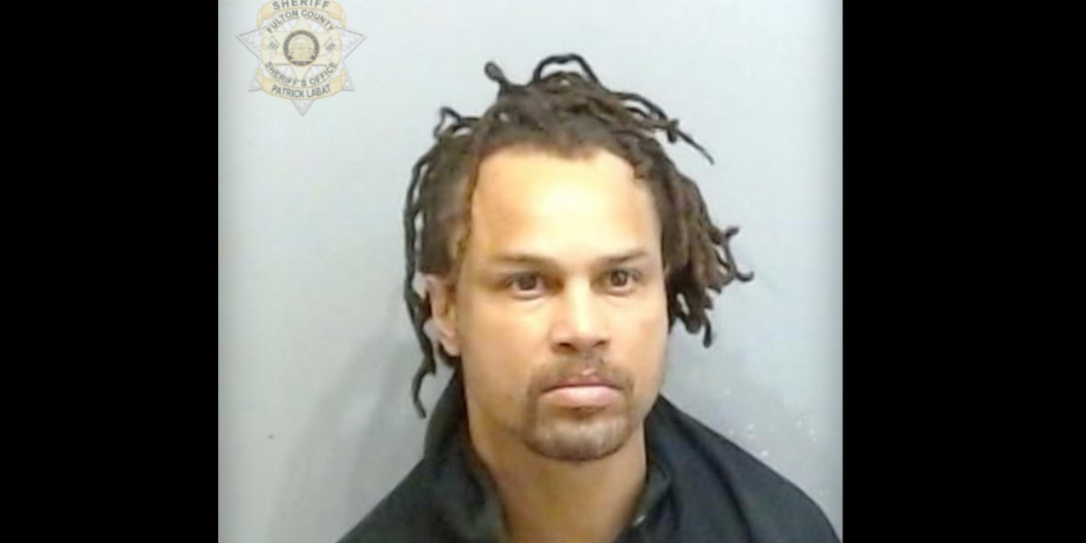 Suspect in Cincinnati mob assault charged with punching woman in the face, reportedly knocking her unconscious, is taken into custody.