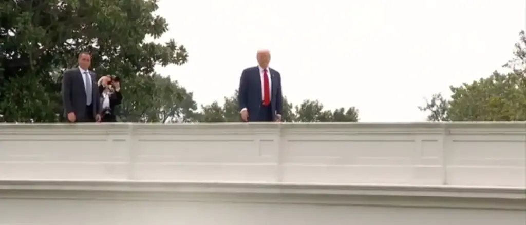 Trump Demonstrates Again That He Will Answer Questions From Any Location—Including The White House Roof