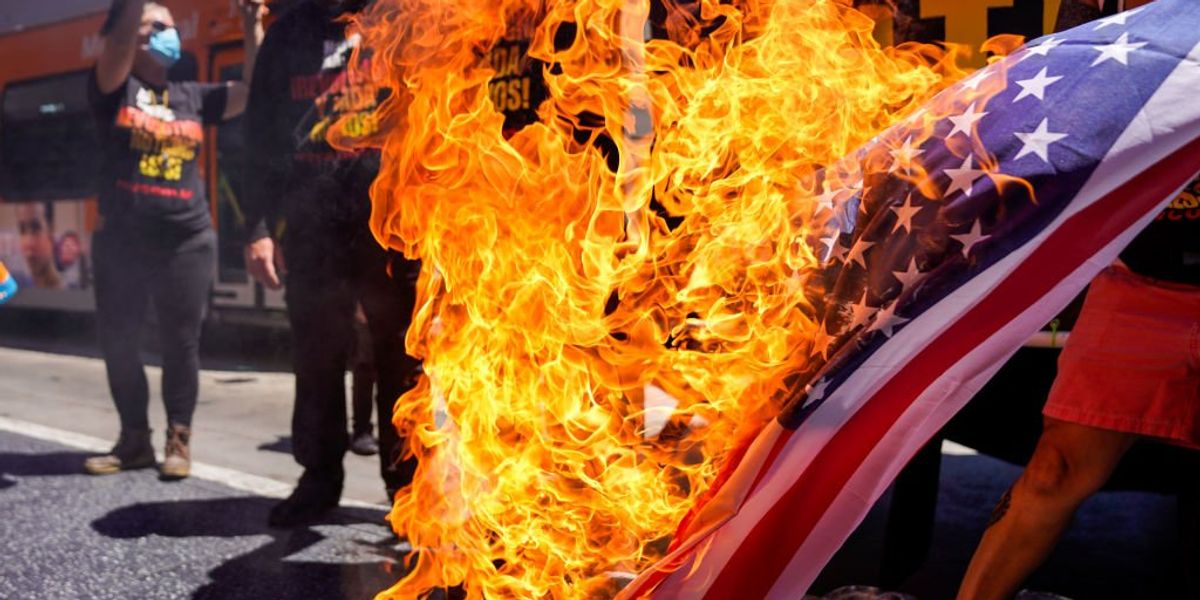 Trump takes action against those who burn the American flag, possibly leading to imprisonment.