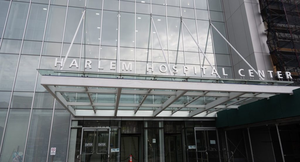 Two construction workers in Harlem file a lawsuit against contractors they hold responsible for the Legionnaires' outbreak.