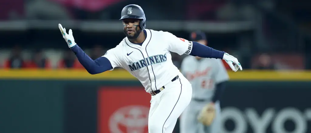 Victor Robles of the Mariners throws his bat at a pitcher after getting hit by a pitch in a fit of rage.