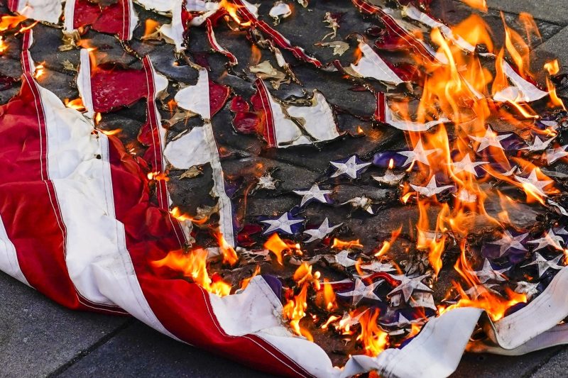 What happens if the American flag is burned following Trump's executive order?