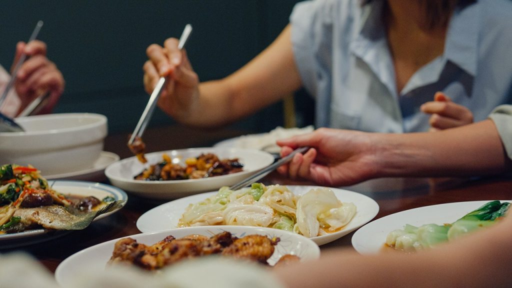 Woman thinks about avoiding family dinners because of mother-in-law's Chinese food.