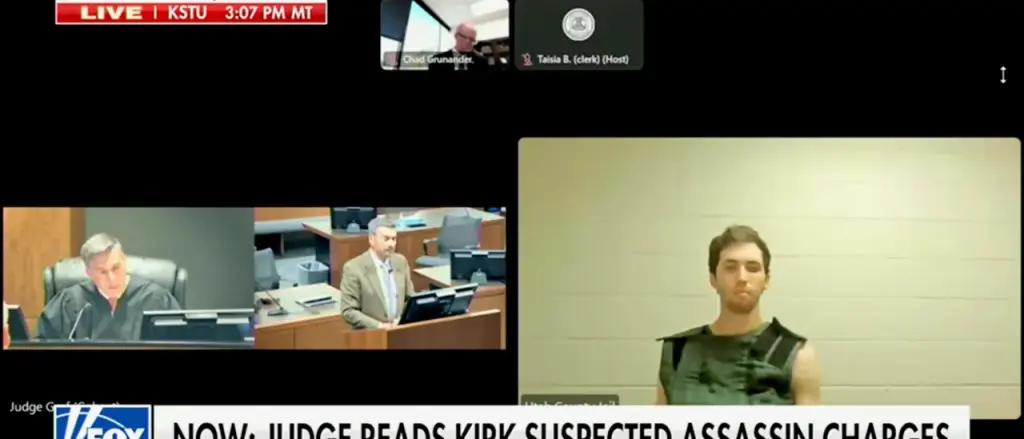 Accused Assassin of Charlie Kirk Remains Unmoved as Charges Are Presented in Court