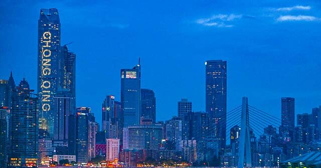 Activist Illuminates Skyscraper with Anti-Communist Message