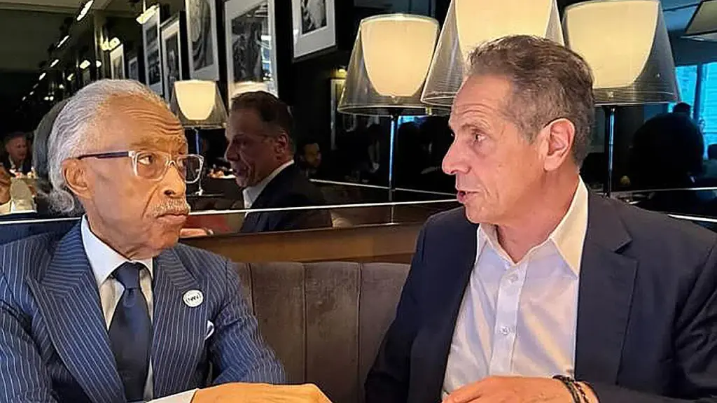 Andrew Cuomo discusses with Al Sharpton during the New York City mayoral race