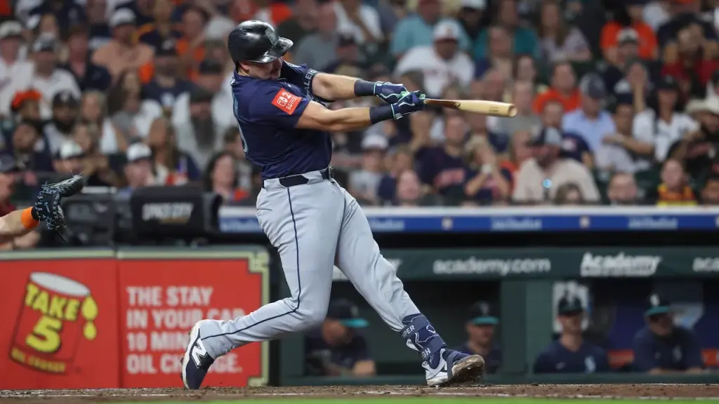 Cal Raleigh sets a new Mariners home run record with his 57th shot, surpassing Ken Griffey Jr.