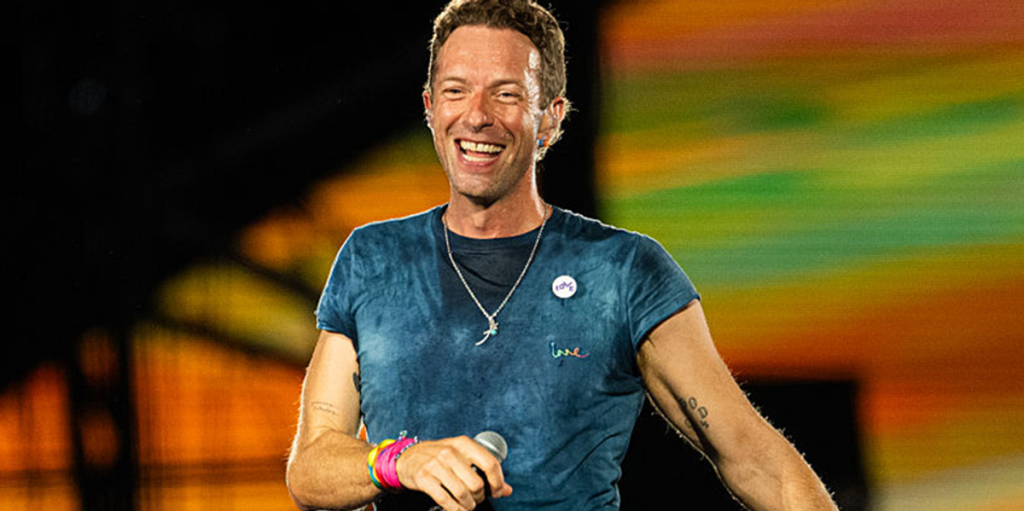 Chris Martin encourages the audience to send their love to Charlie Kirk's family.