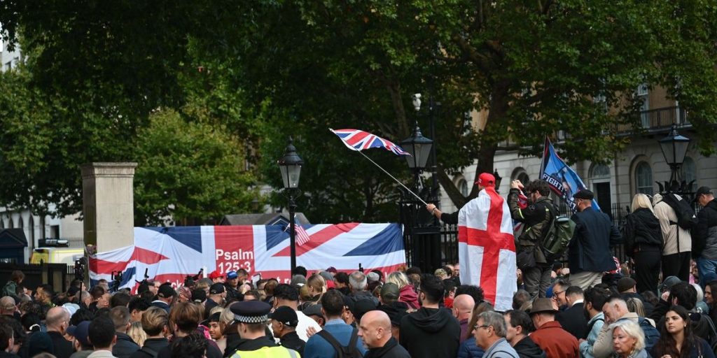 Crowds chant "Christ is king" during a significant memorial for Charlie Kirk in London