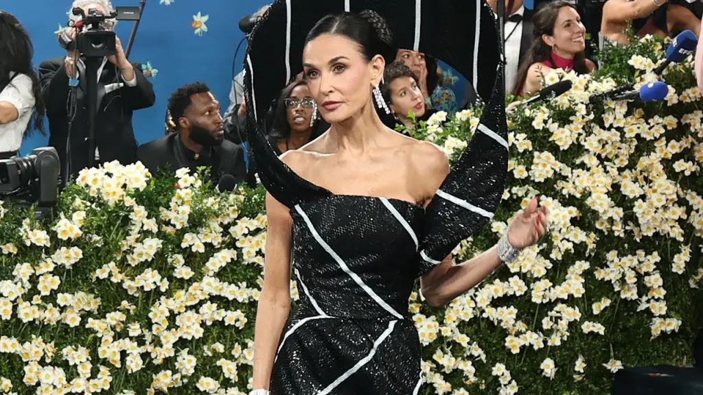 Demi Moore supports Bruce Willis' wife Emma in response to criticism over dementia care.