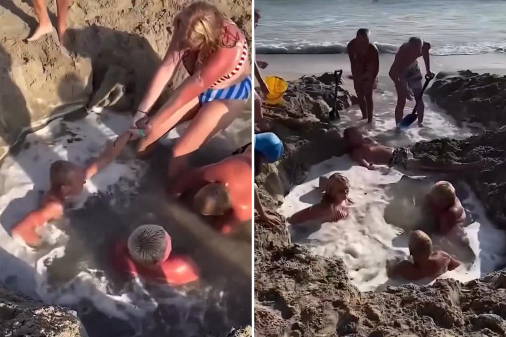 Desperate beachgoers in California rush to rescue boys stuck in a sand hole after it gets flooded.