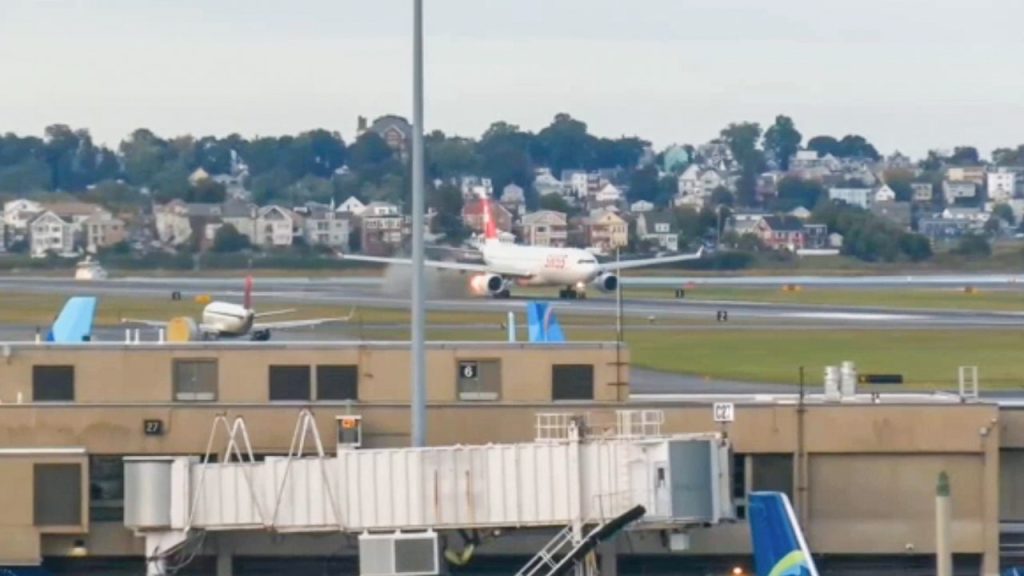 Fire erupts from Swiss Air engine during takeoff attempt at Boston Logan