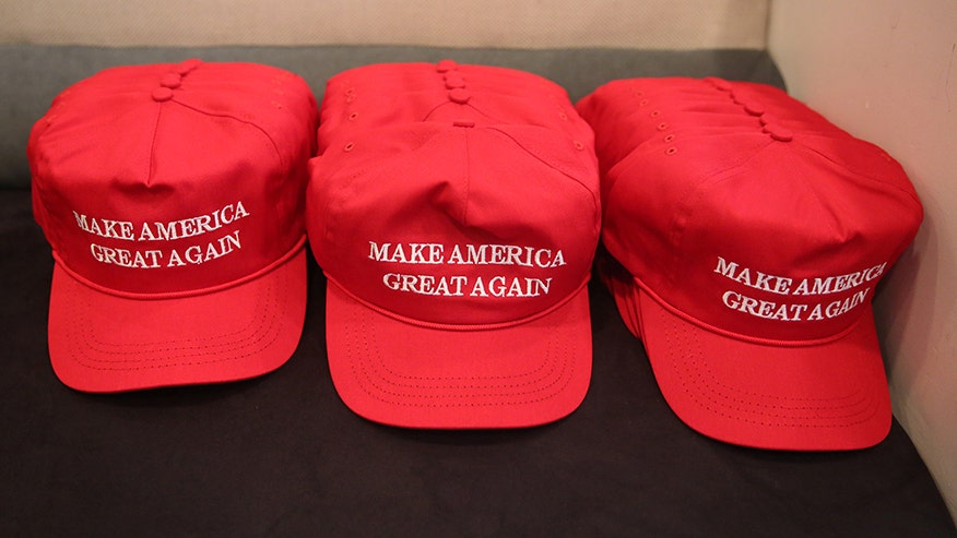 Halloween display in Houston showcases mannequins in red hats suspended from gallows