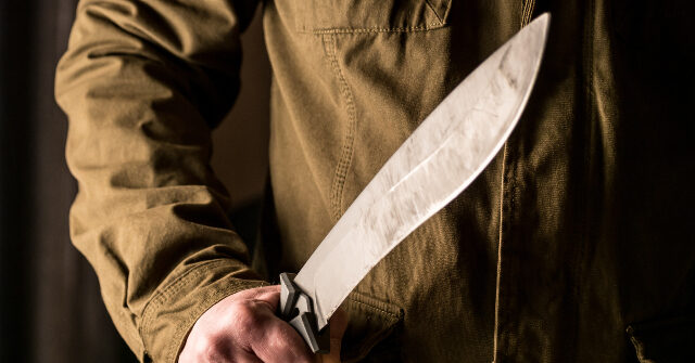 Illegal Immigrant Released by Biden Seen Carrying Severed Head Through Texas Motel Parking Lot