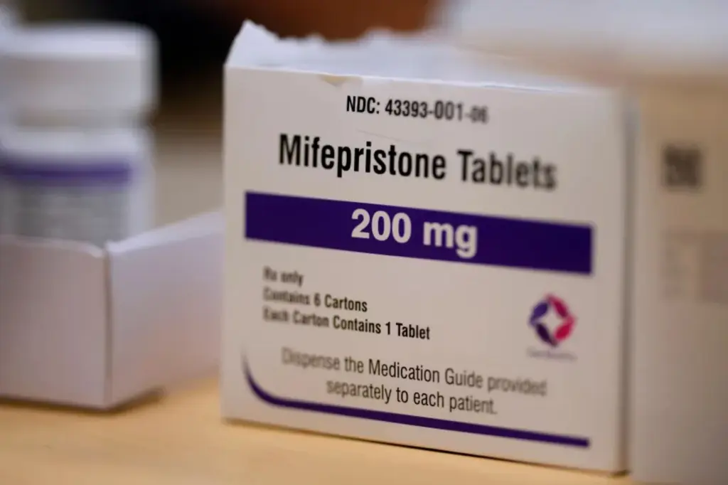 Louisiana issues arrest warrant for California doctor charged with sending abortion pills, breaching state law.