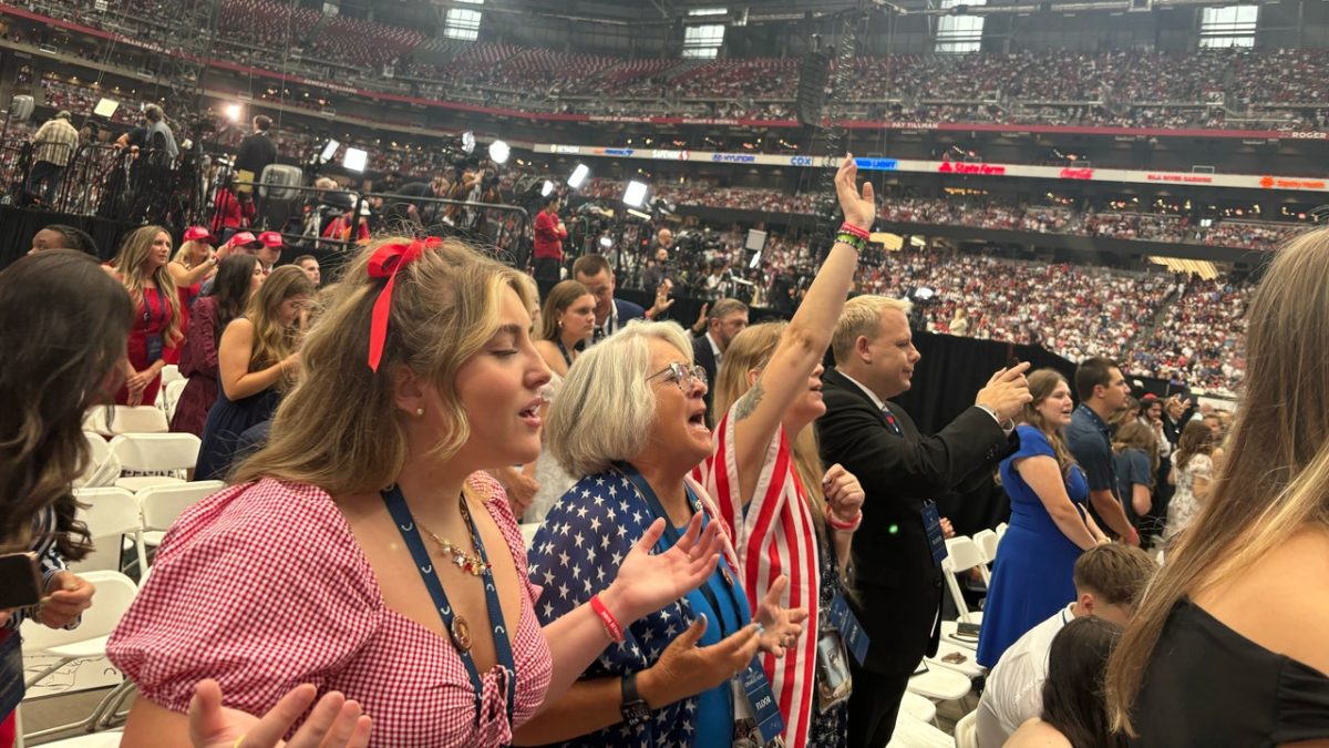 Memorial for Charlie Kirk in Arizona highlights faith and God, attracting large crowds.