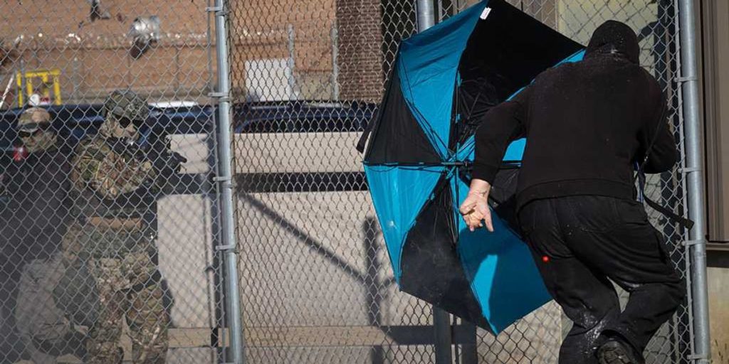 Person accused of carrying a gun taken into custody outside Illinois ICE center