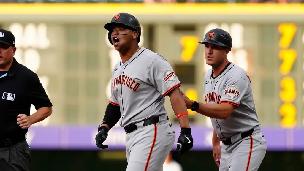 Players rush onto the field in Giants-Rockies game after Rafael Devers enjoys his home run