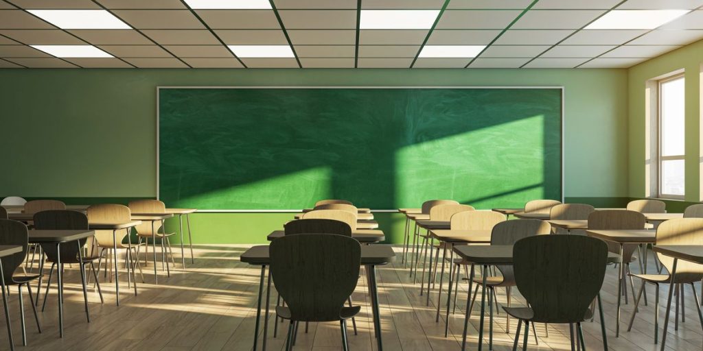 School employee Charlotte Huesby is charged with a felony for an alleged inappropriate relationship with a minor student, following the discovery of inappropriate texts and video evidence that prompted immediate action from the school.