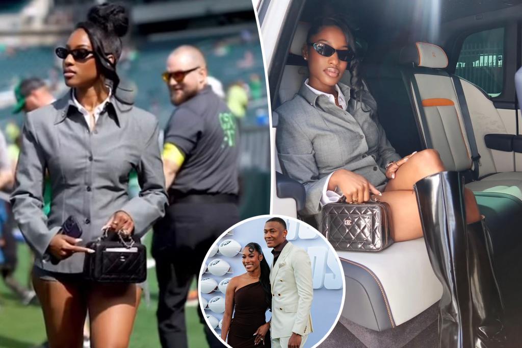 Security guard seen looking at DeVonta Smith's fiancée