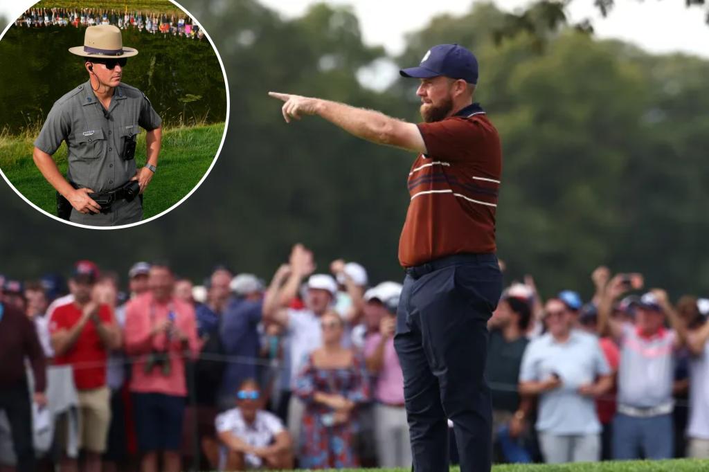 Shane Lowry has a fan removed from the Ryder Cup as state police increase security.