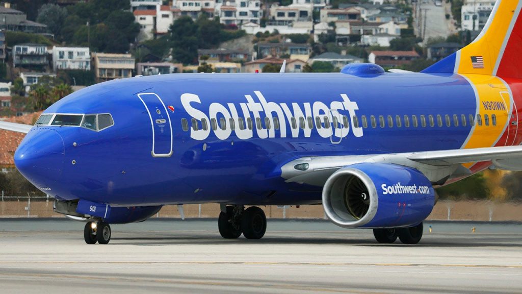 Southwest operates its inaugural flight featuring a new safety barrier in the cockpit.