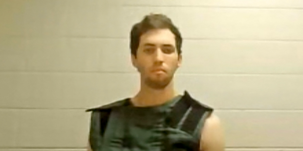 Suspected assassin of Charlie Kirk, now facing the death penalty, appears in court for the first time.